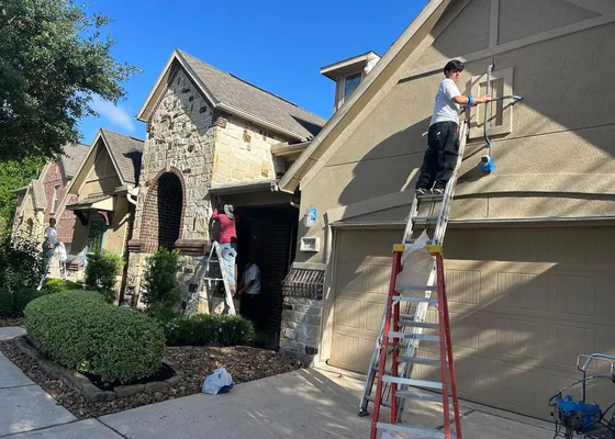 Two-story brick home with pool in a Katy, TX master-planned community