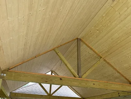 Wood framing for a covered patio addition under construction in Houston
